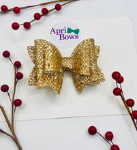 Load image into Gallery viewer, Gold glitter bow
