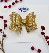 Load image into Gallery viewer, Gold glitter bow
