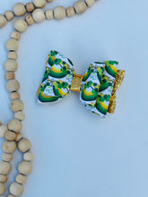 Load image into Gallery viewer, St Patricks day gold bow
